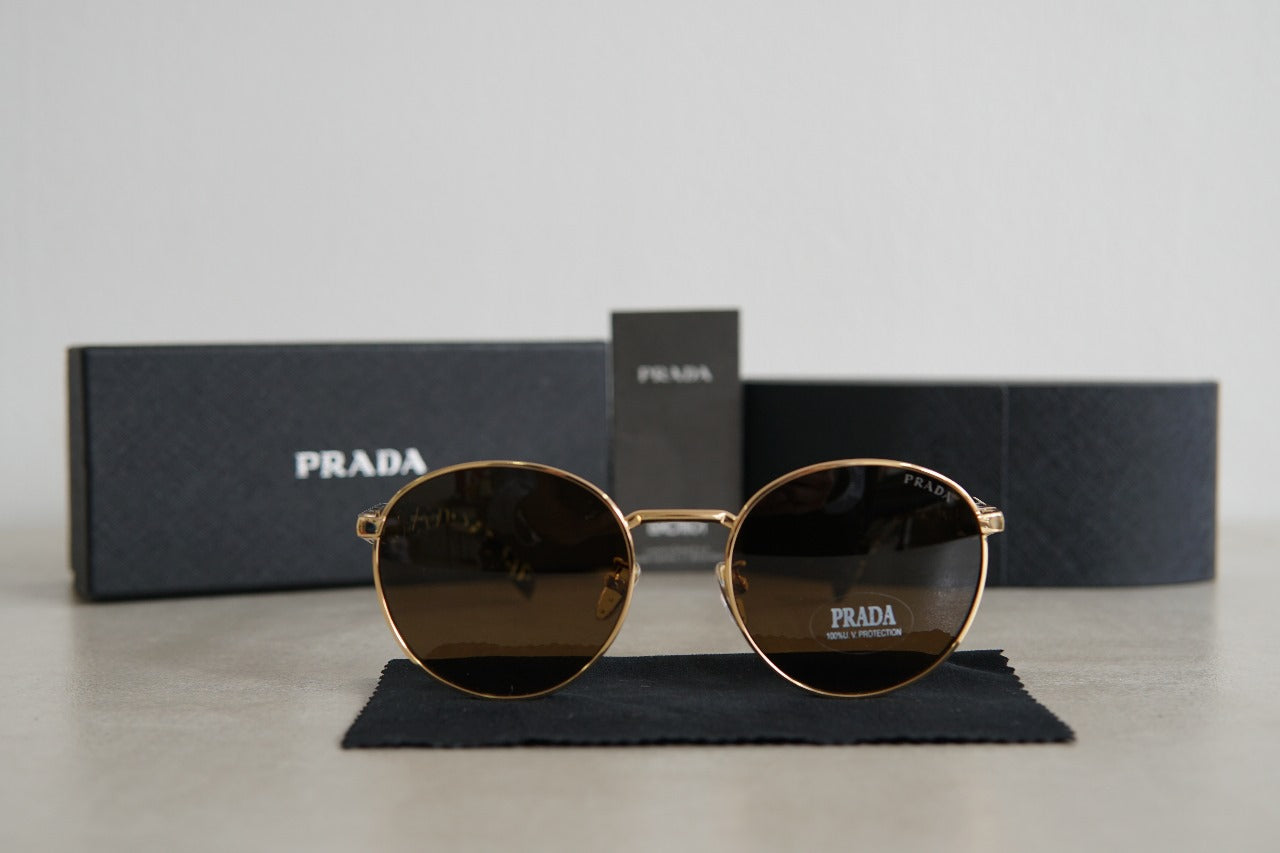 Lentes de Sol Prada PR 56 ZS Pale Gold Marrón Oscuro