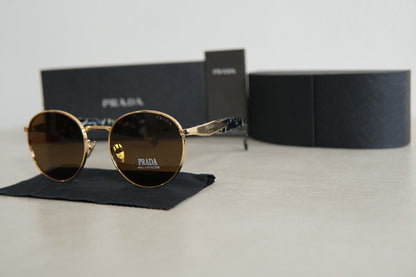 Lentes de Sol Prada PR 56 ZS Pale Gold Marrón Oscuro