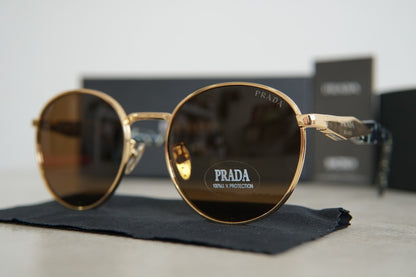 Lentes de Sol Prada PR 56 ZS Pale Gold Marrón Oscuro